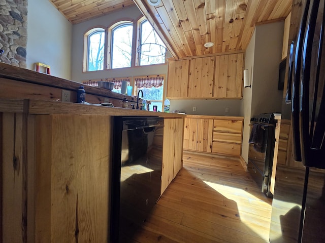 kitchen featuring black appliances, light wood-style flooring, light brown cabinets, wooden ceiling, and lofted ceiling