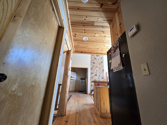 corridor featuring wooden ceiling and hardwood / wood-style flooring