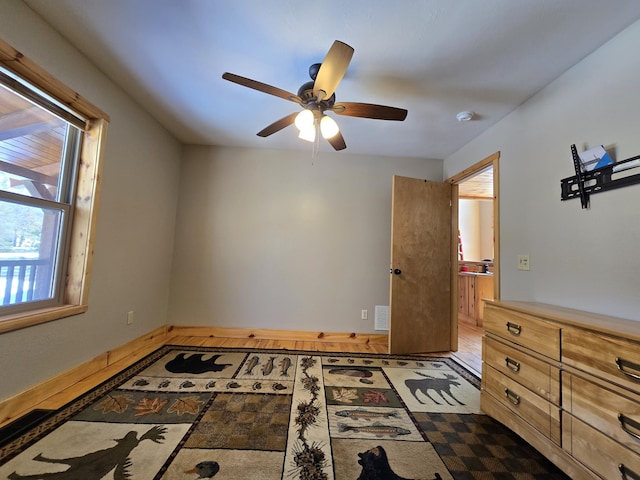 bedroom with visible vents and a ceiling fan