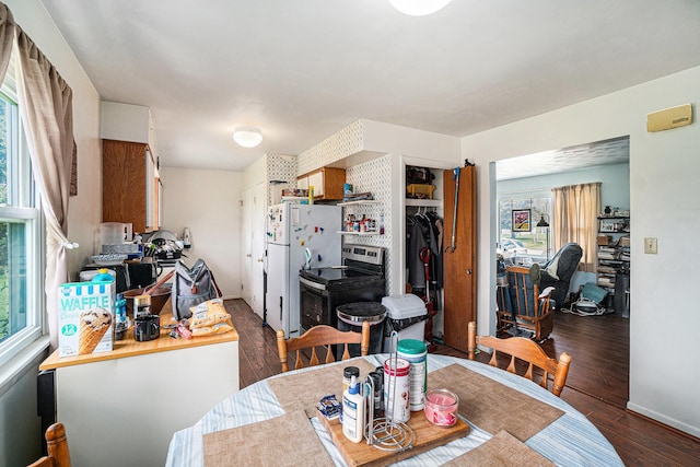 1114 Brooktrout Ln, Gaylord, MI 49735 - dining area featuring wood finished floors and baseboards