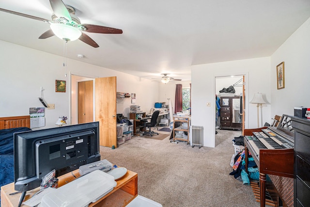 1114 Brooktrout Ln, Gaylord, MI 49735 - living room with a ceiling fan, carpet flooring, and an office area