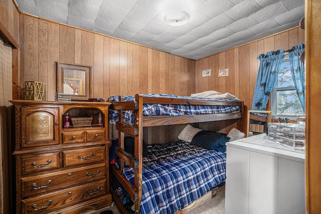 4421 Kimball Ave, Gaylord, MI 49735 - bedroom with carpet flooring and wood walls
