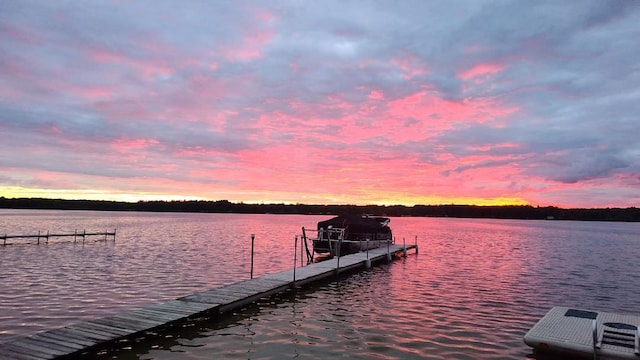 4421 Kimball Ave, Gaylord, MI 49735 - view of dock featuring a water view