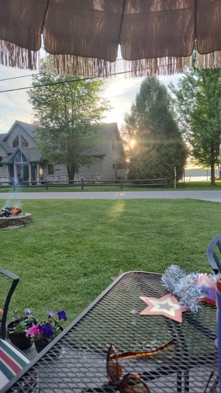 4421 Kimball Ave, Gaylord, MI 49735 - view of property's community featuring a lawn