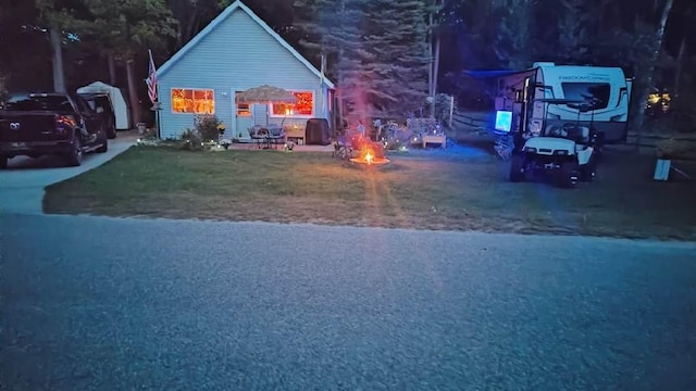 4421 Kimball Ave, Gaylord, MI 49735 - view of front facade with an outdoor fire pit