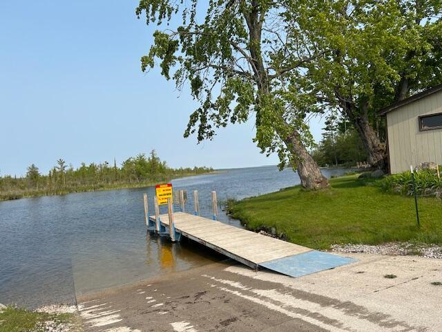 1467 N Black River Rd, Cheboygan, MI 49721 - dock with a boat ramp and a water view