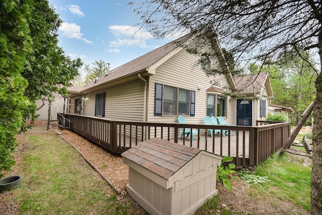 5313 S Pine St, Beaverton, MI 48612 - back of house with a deck