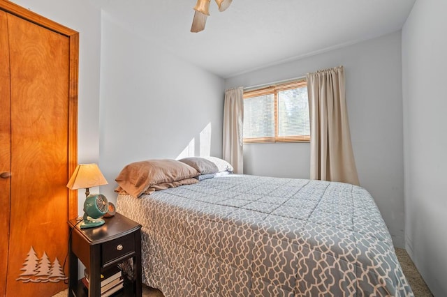 6122 Beach Rd, Johannesburg, MI 49751 - carpeted bedroom with ceiling fan