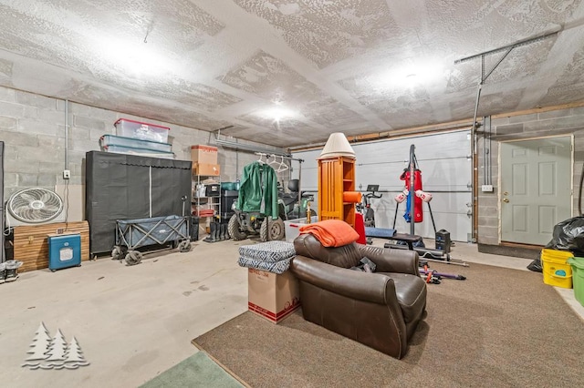 6122 Beach Rd, Johannesburg, MI 49751 - garage featuring concrete block wall