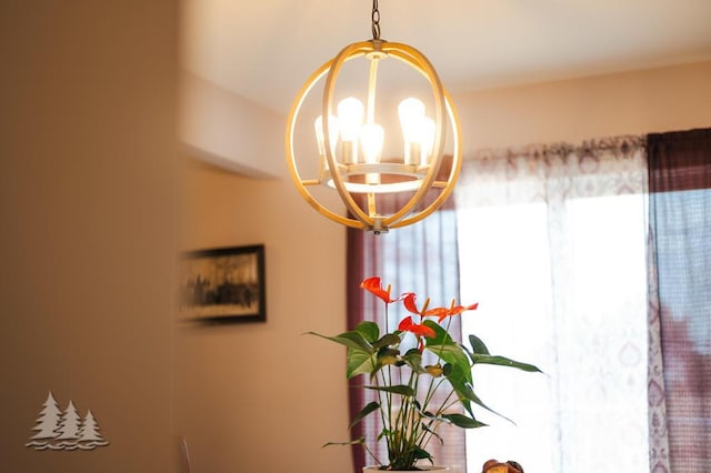 3211 Jenson St, Lewiston, MI 49756 - details with an inviting chandelier