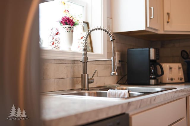3211 Jenson St, Lewiston, MI 49756 - kitchen featuring light countertops and decorative backsplash