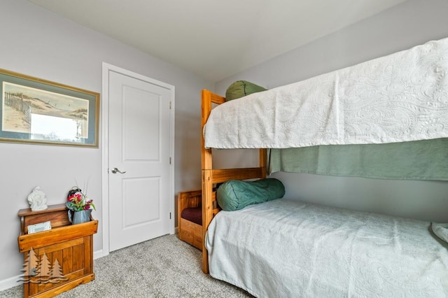 3211 Jenson St, Lewiston, MI 49756 - bedroom featuring baseboards and carpet floors