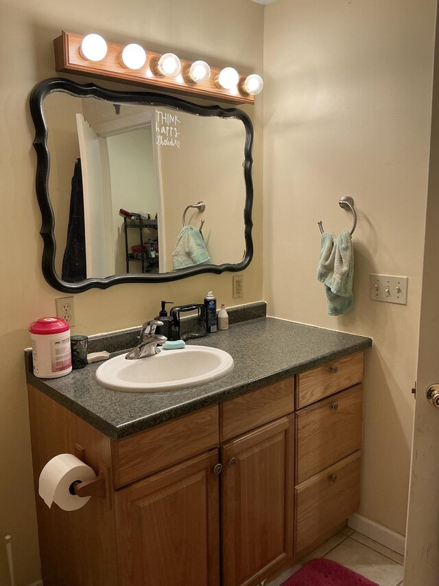 2007 M30, Gladwin, MI 48624 - bathroom featuring vanity and tile patterned floors