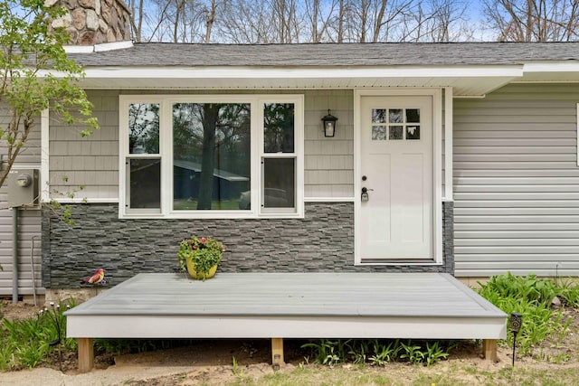 6830 Elmwood, Indian River, MI 49749 - doorway to property with stone siding