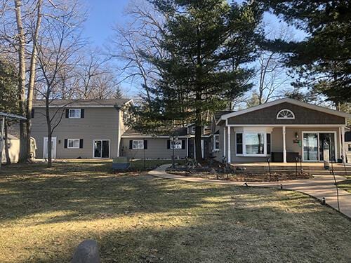 605 Sam-O-Set Blvd, Roscommon, MI 48653 - view of front of home with a front lawn