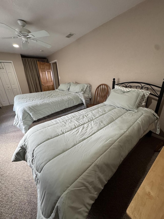 605 Sam-O-Set Blvd, Roscommon, MI 48653 - bedroom featuring carpet flooring, ceiling fan, and visible vents