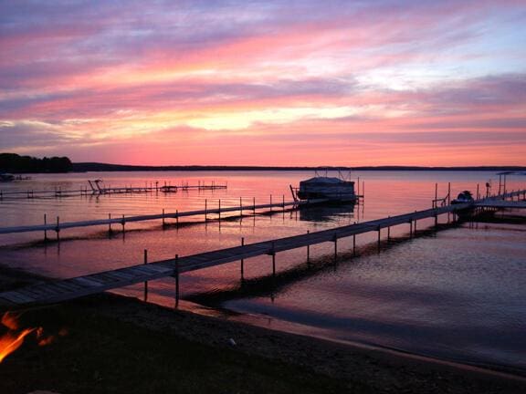 605 Sam-O-Set Blvd, Roscommon, MI 48653 - view of dock with boat lift and a water view