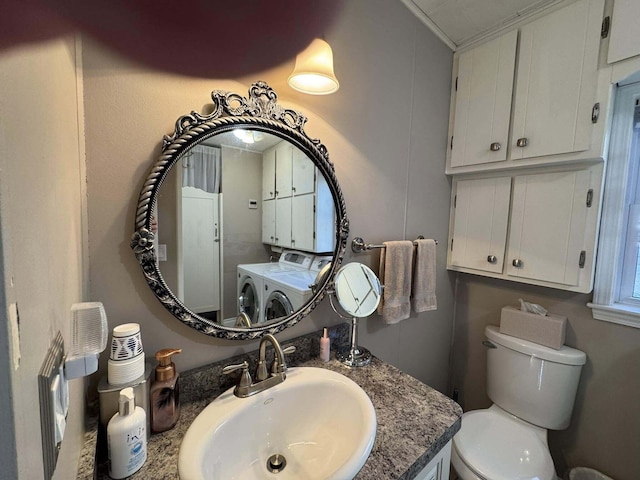 605 Sam-O-Set Blvd, Roscommon, MI 48653 - half bathroom with independent washer and dryer, vanity, and toilet