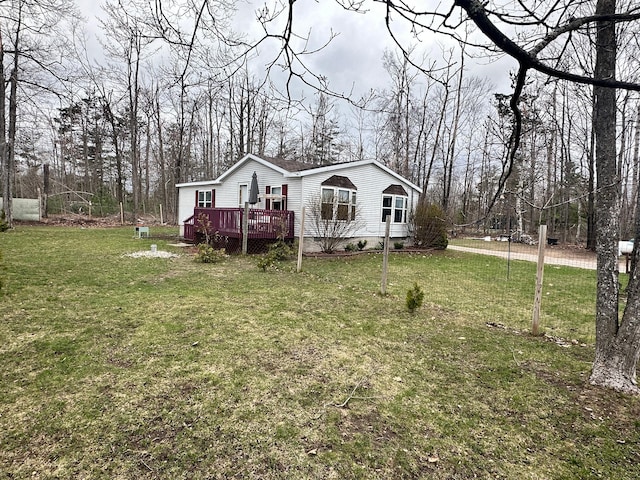 5128 Krys Rd, Gaylord, MI 49735 - view of front of property with a front lawn and a deck