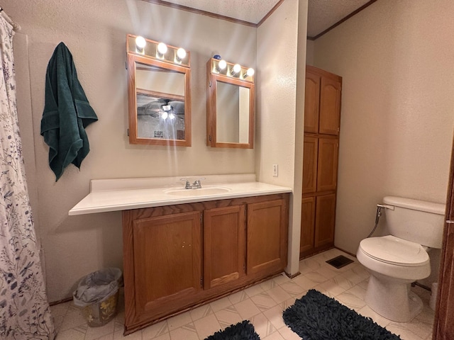 5128 Krys Rd, Gaylord, MI 49735 - full bathroom featuring toilet, a ceiling fan, ornamental molding, and vanity