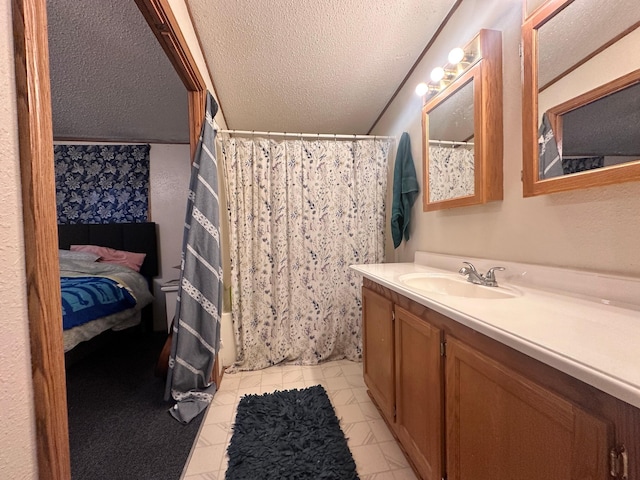 5128 Krys Rd, Gaylord, MI 49735 - bathroom featuring a shower with curtain, a textured ceiling, and vanity
