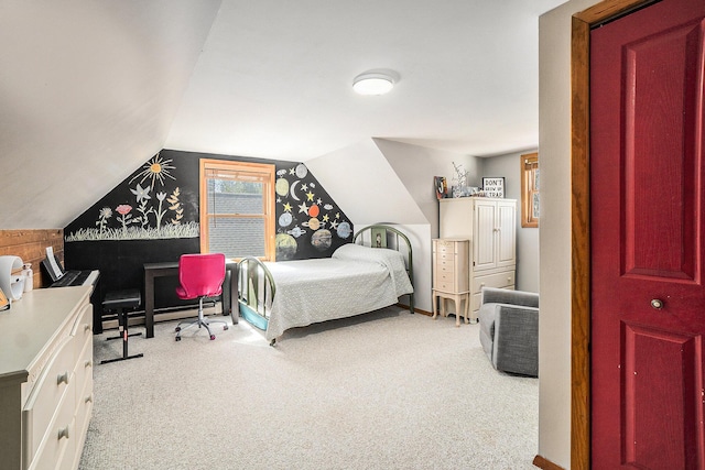 bedroom with a baseboard radiator, vaulted ceiling, and carpet flooring