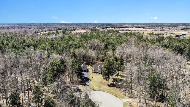 aerial view featuring a view of trees
