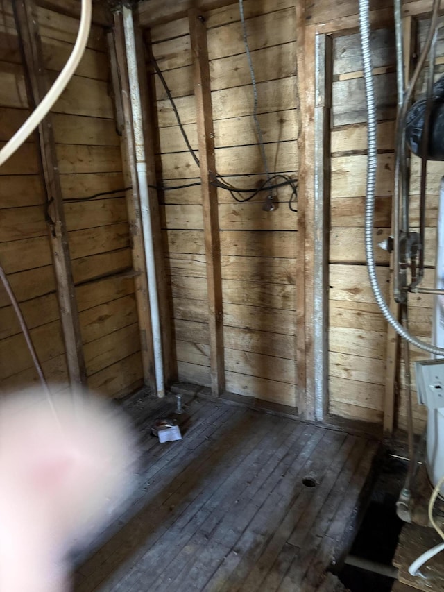 9419 W Airport Rd, Saint Helen, MI 48656 - interior space with hardwood / wood-style flooring and wooden walls