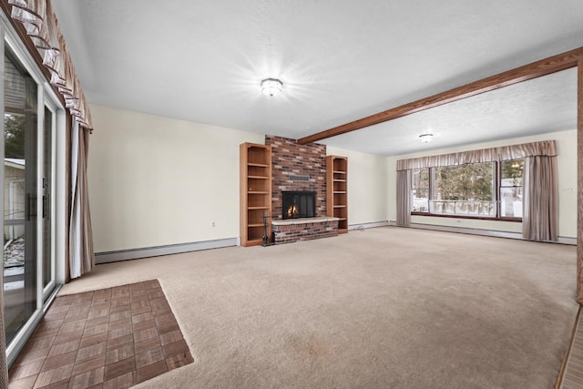 1384 W Higgins Lake Dr, Roscommon, MI 48653 - unfurnished living room featuring a baseboard radiator, carpet flooring, baseboards, beamed ceiling, and a brick fireplace