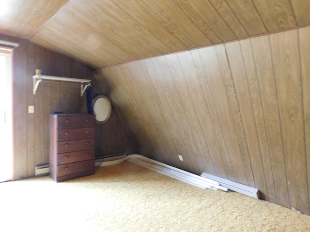 277 Wendy Ln, Grayling, MI 49738 - additional living space with lofted ceiling, carpet flooring, wood walls, and wooden ceiling