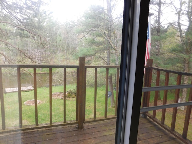 277 Wendy Ln, Grayling, MI 49738 - wooden deck featuring a yard and a forest view