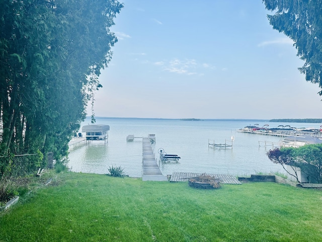 6382 W Higgins Lake Dr, Roscommon, MI 48653 - water view with a boat dock