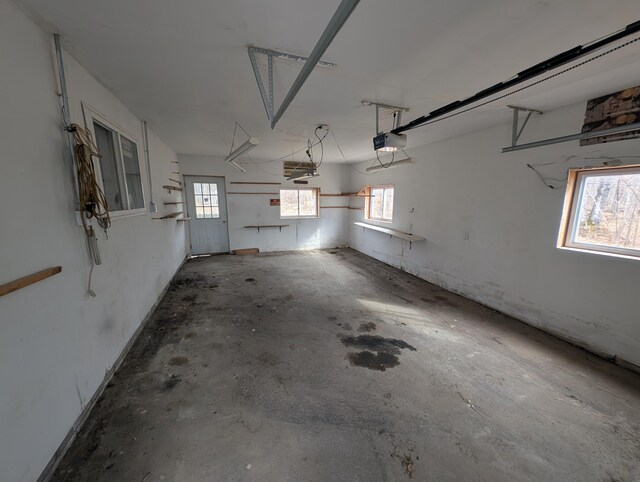 20776 Tennis Rd, Hillman, MI 49746 - garage with a garage door opener