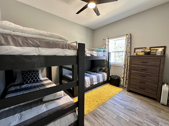 bedroom with wood finished floors and ceiling fan