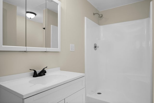 12320 E Houghton Lake Dr, Houghton Lake, MI 48629 - full bathroom with vanity and a shower