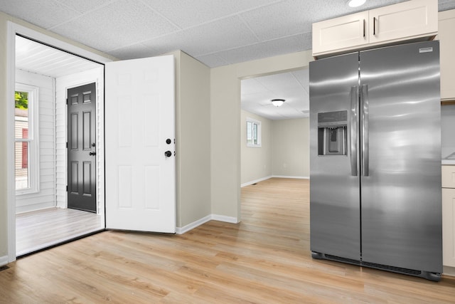 12320 E Houghton Lake Dr, Houghton Lake, MI 48629 - entrance foyer featuring baseboards and light wood-style floors