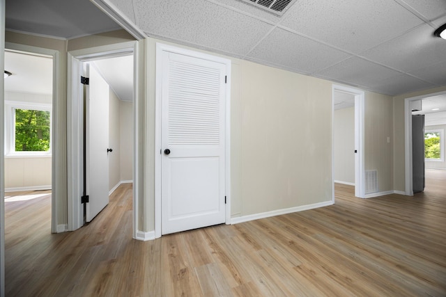12320 E Houghton Lake Dr, Houghton Lake, MI 48629 - empty room featuring baseboards and wood finished floors