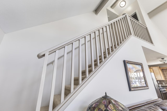 6150 Northpoint Dr, Saint Helen, MI 48656 - stairway featuring beamed ceiling