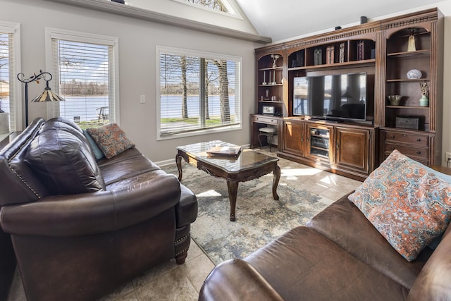 6150 Northpoint Dr, Saint Helen, MI 48656 - living room with vaulted ceiling, healthy amount of natural light, and light tile patterned floors