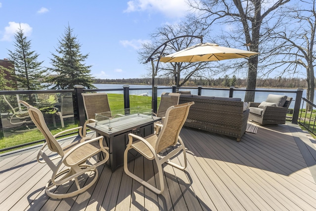 6150 Northpoint Dr, Saint Helen, MI 48656 - wooden terrace featuring a water view, outdoor dining space, and an outdoor hangout area