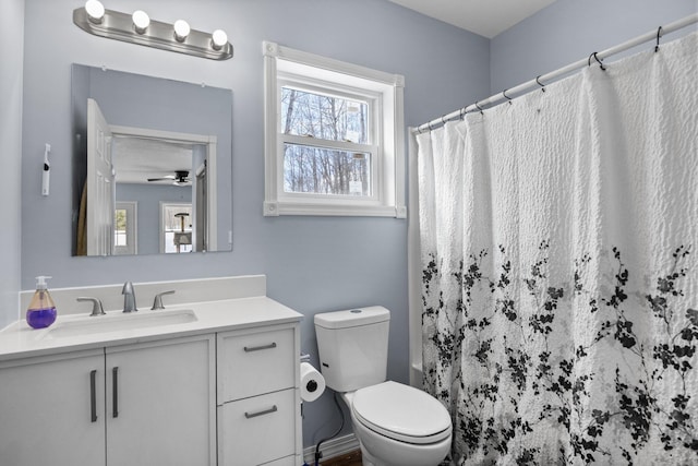 635 Gazelle St, Gaylord, MI 49735 - full bath featuring a shower with shower curtain, vanity, toilet, and ceiling fan