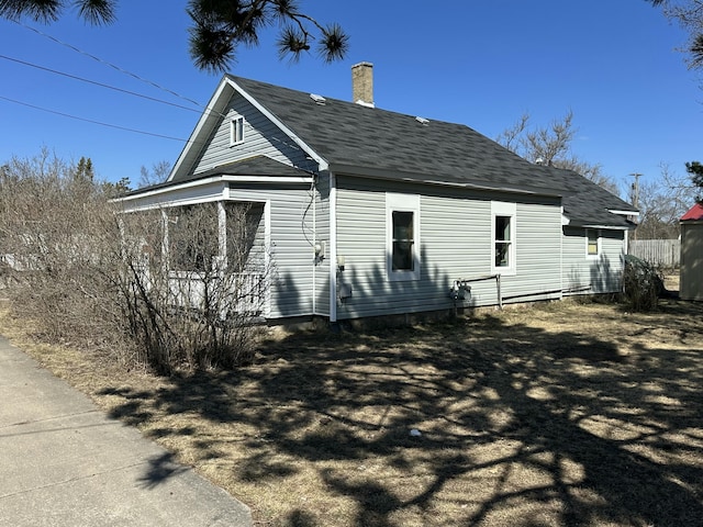 401 Mikado St, Grayling, MI 49738 - view of front of property featuring a chimney