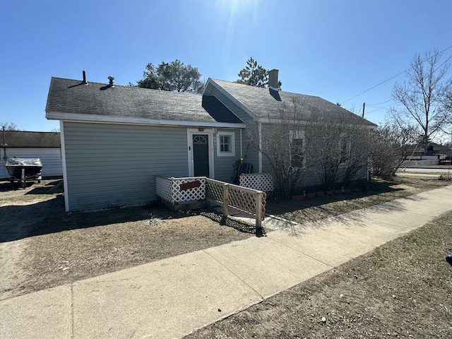 401 Mikado St, Grayling, MI 49738 - view of front of home featuring roof with shingles