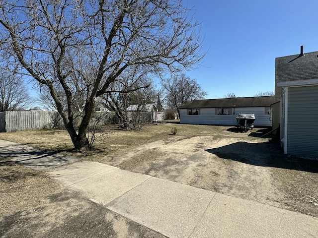 401 Mikado St, Grayling, MI 49738 - view of yard featuring fence and dirt driveway