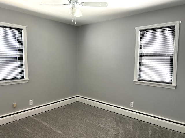 carpeted empty room with baseboard heating and ceiling fan