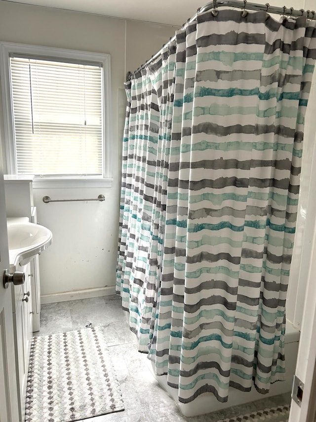 bathroom featuring curtained shower
