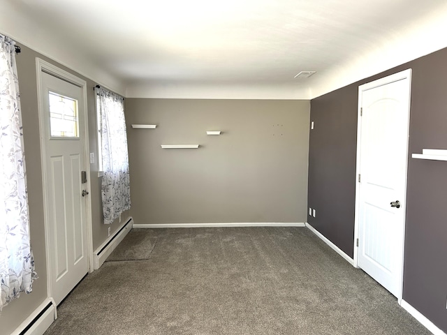 carpeted foyer featuring visible vents, a baseboard radiator, and baseboards