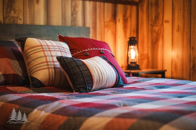 bedroom featuring wood walls
