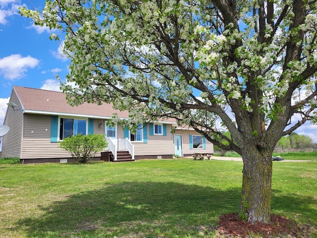 626 W Finerty Rd, West Branch, MI 48661 - view of front of house featuring a front yard