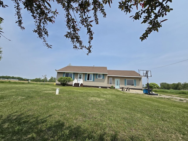 626 W Finerty Rd, West Branch, MI 48661 - view of front of home with a front lawn and entry steps